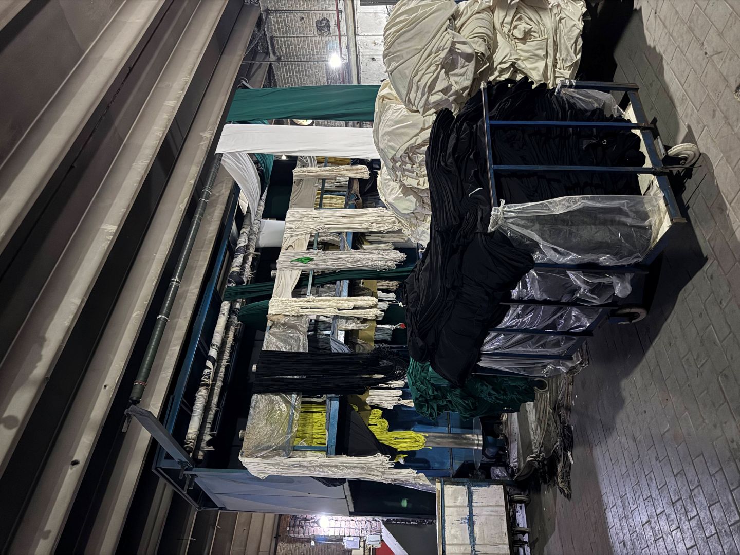 Atelier reference loop — fabric handling on the studio floor.